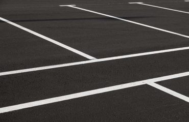 Close image of an Asphalt Parking Lot built by APS Chipsealing and Asphalt Paving in Tucson, AZ