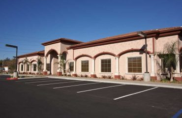 Asphalt parking lot with repaired asphalt by APS Chipsealing and Asphalt Paving in Tucson, Arizona